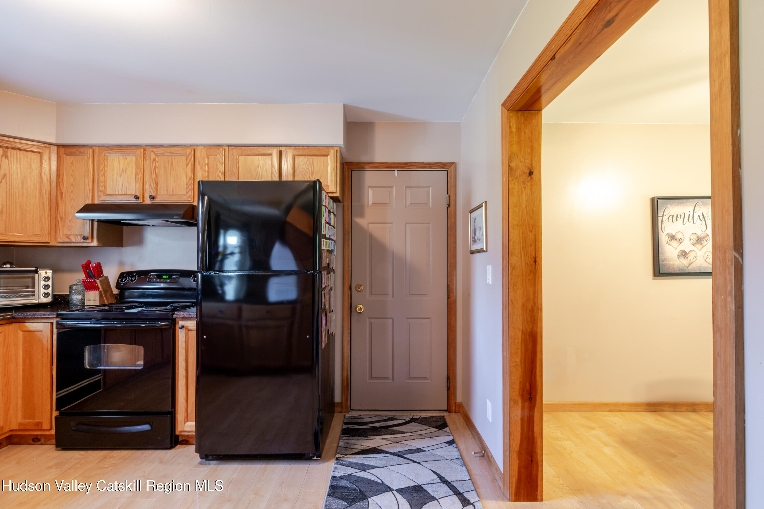 23 Maple Lane Copake Falls, NY 12517 - Photo 14 of 40 a kitchen with stainless steel appliances granite countertop a refrigerator and a stove