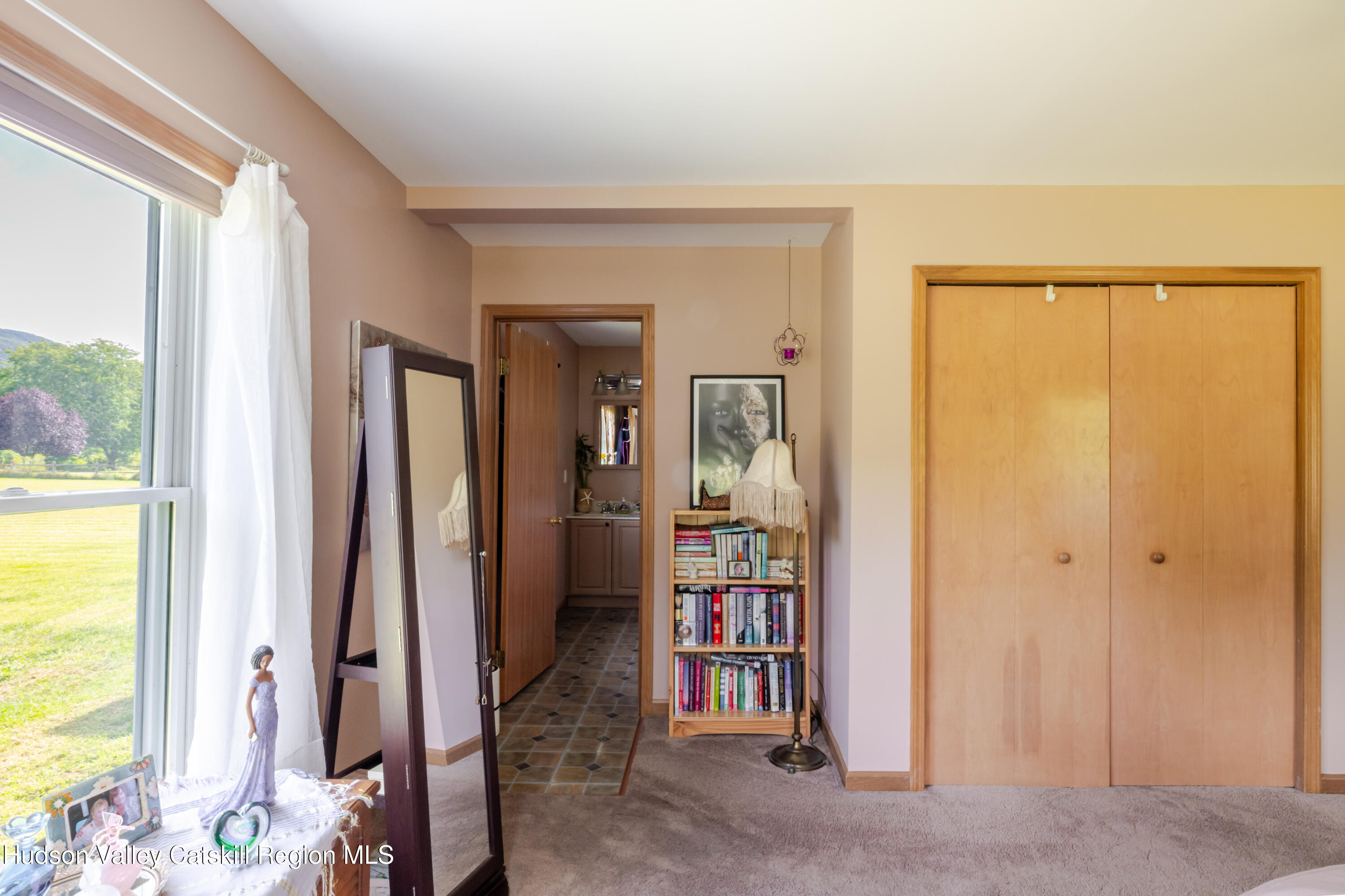 23 Maple Lane Copake Falls, NY 12517 - Photo 19 of 40 a view of an entryway with a floor to ceiling window