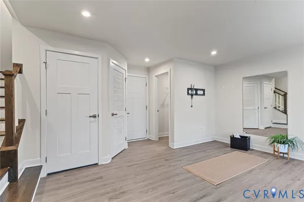 a view of livingroom with hardwood floor and hallway