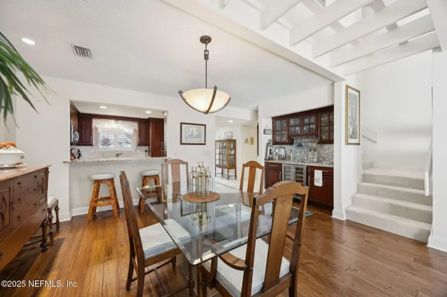 a hallway with a television and a couch