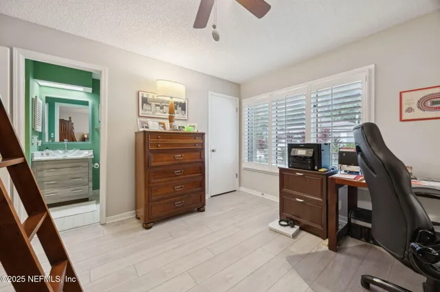 a view of a kitchen from the hallway