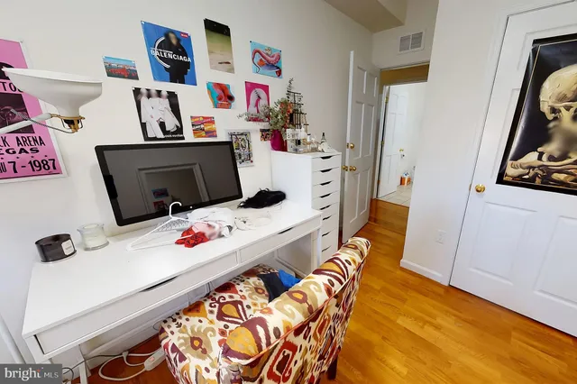 a bedroom with furniture and a bed