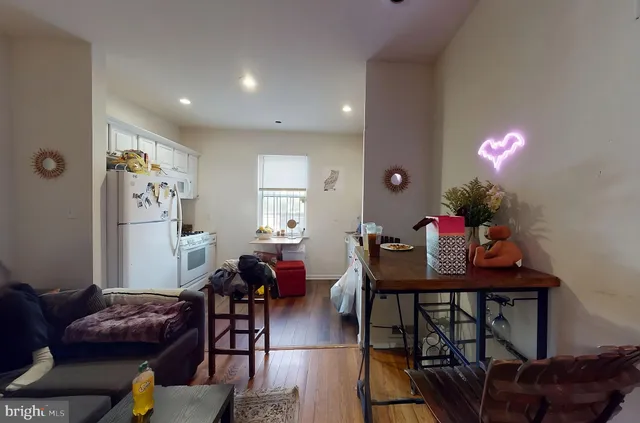 a view of a livingroom with furniture and window