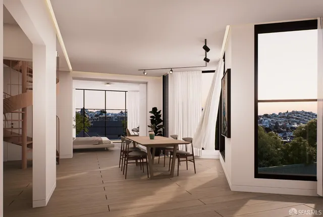 a view of a livingroom with furniture and a window