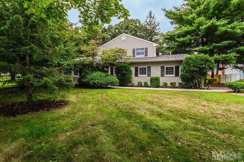 1 Butler Road Edison, NJ 08820 - Photo 1 of 25 a front view of house with yard and green space
