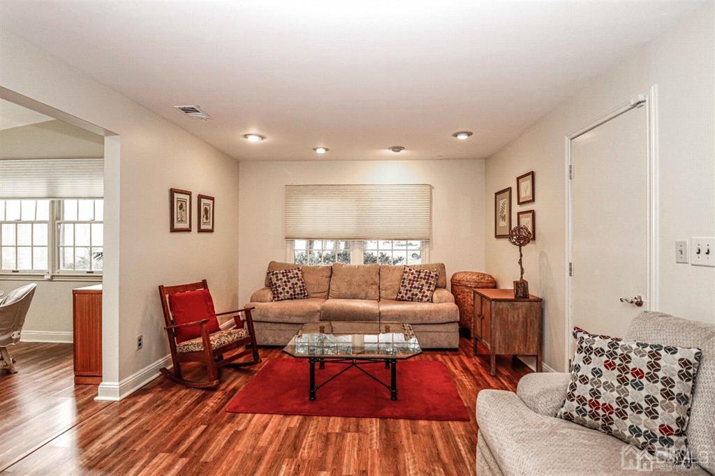 1 Butler Road Edison, NJ 08820 - Photo 11 of 25 a living room with furniture and wooden floor
