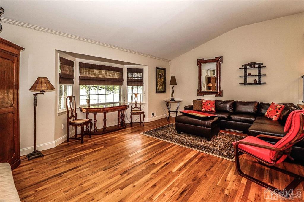 1 Butler Road Edison, NJ 08820 - Photo 13 of 25 a living room with furniture and a wooden floor