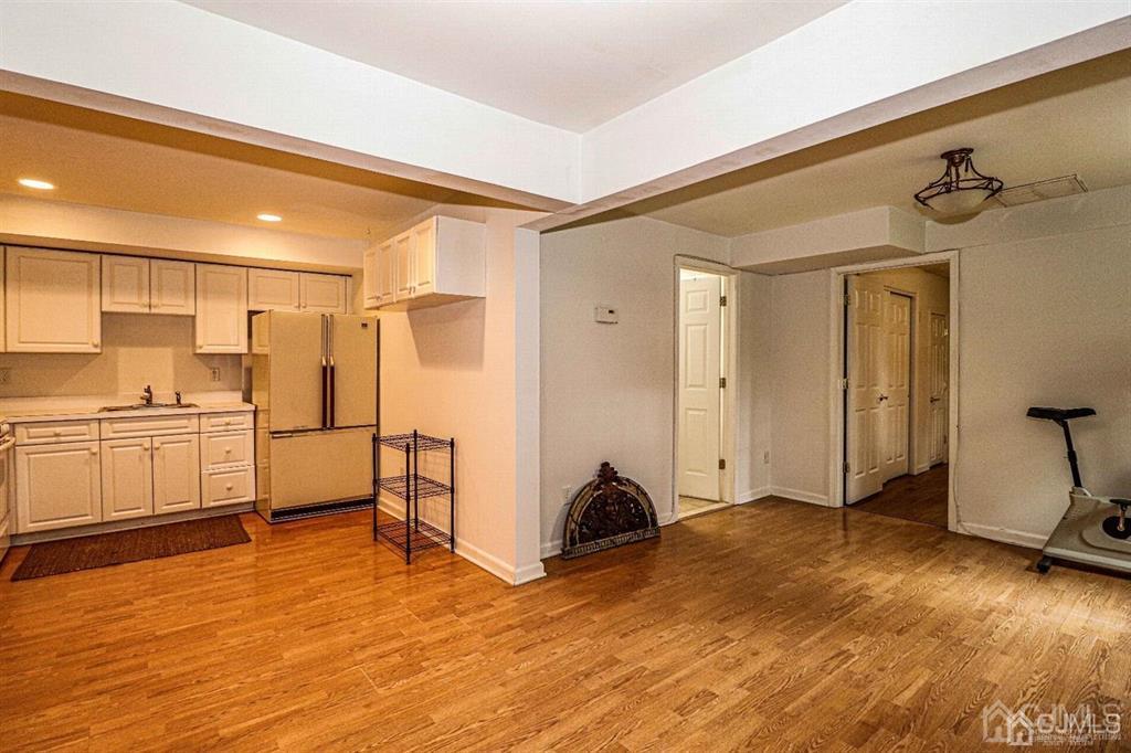 1 Butler Road Edison, NJ 08820 - Photo 4 of 25 a view of a kitchen with a sink and cabinets