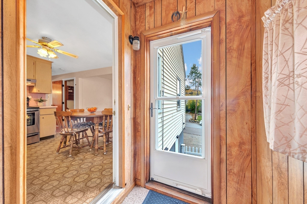 19 Wilbur Avenue Arlington, MA 02476 - Photo 17 of 32 view of a dining room with furniture and a window