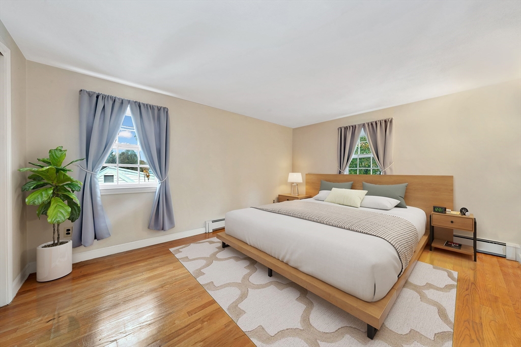 19 Wilbur Avenue Arlington, MA 02476 - Photo 20 of 32 a bedroom with a bed and a window