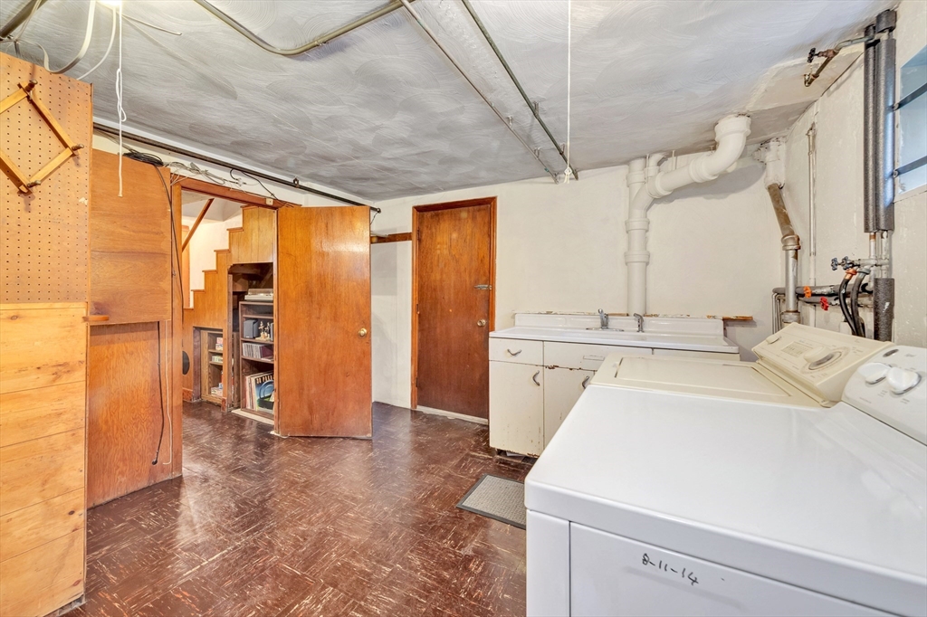 19 Wilbur Avenue Arlington, MA 02476 - Photo 22 of 32 a room with sink and washing machine