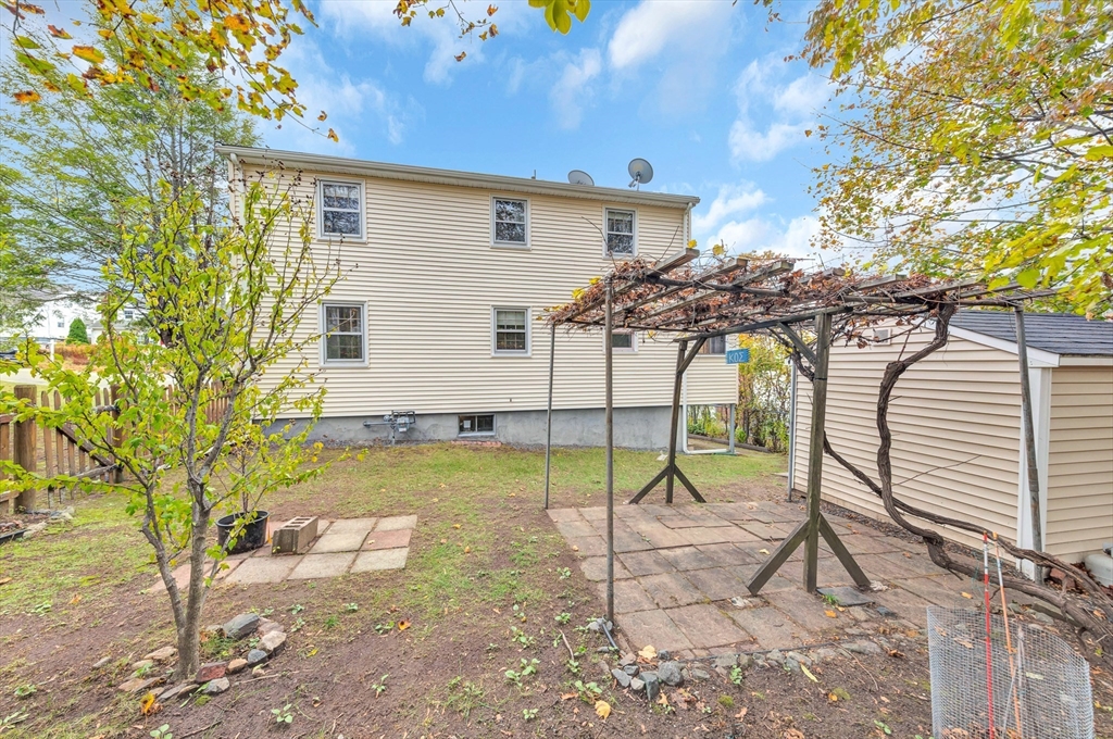 19 Wilbur Avenue Arlington, MA 02476 - Photo 29 of 32 a view of a backyard with chairs