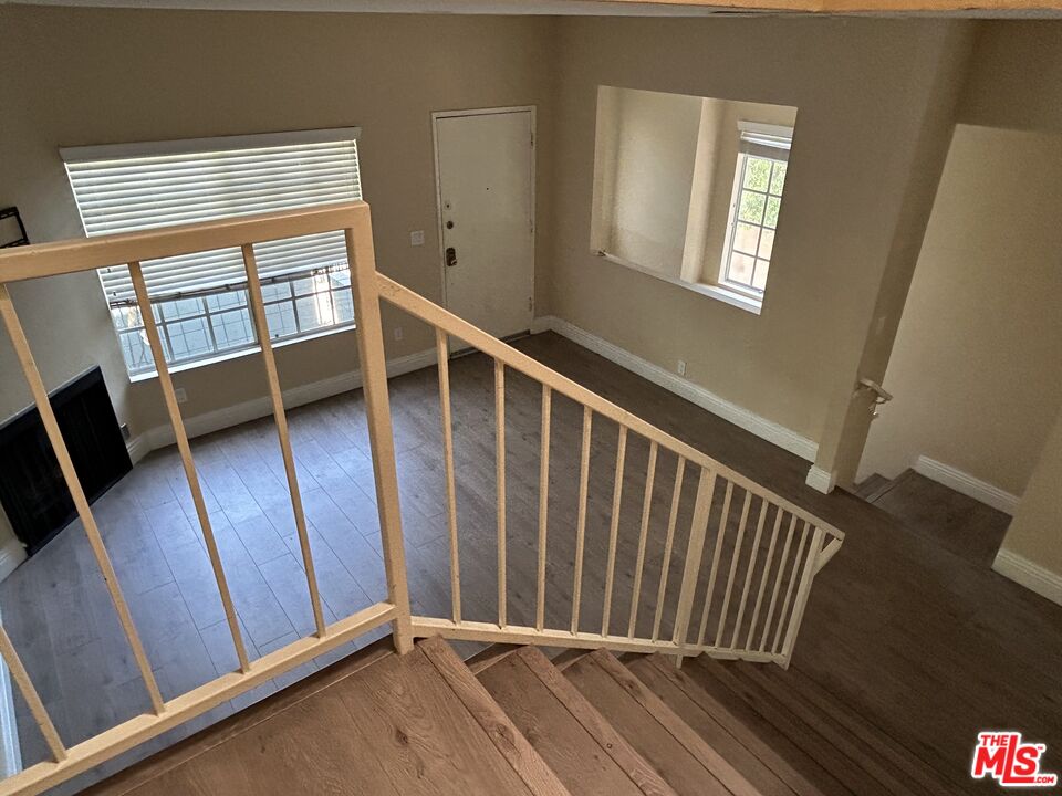 7430 Corbin Avenue, Unit 33 Reseda, CA 91335 - Photo 12 of 28 a view of a hallway with windows