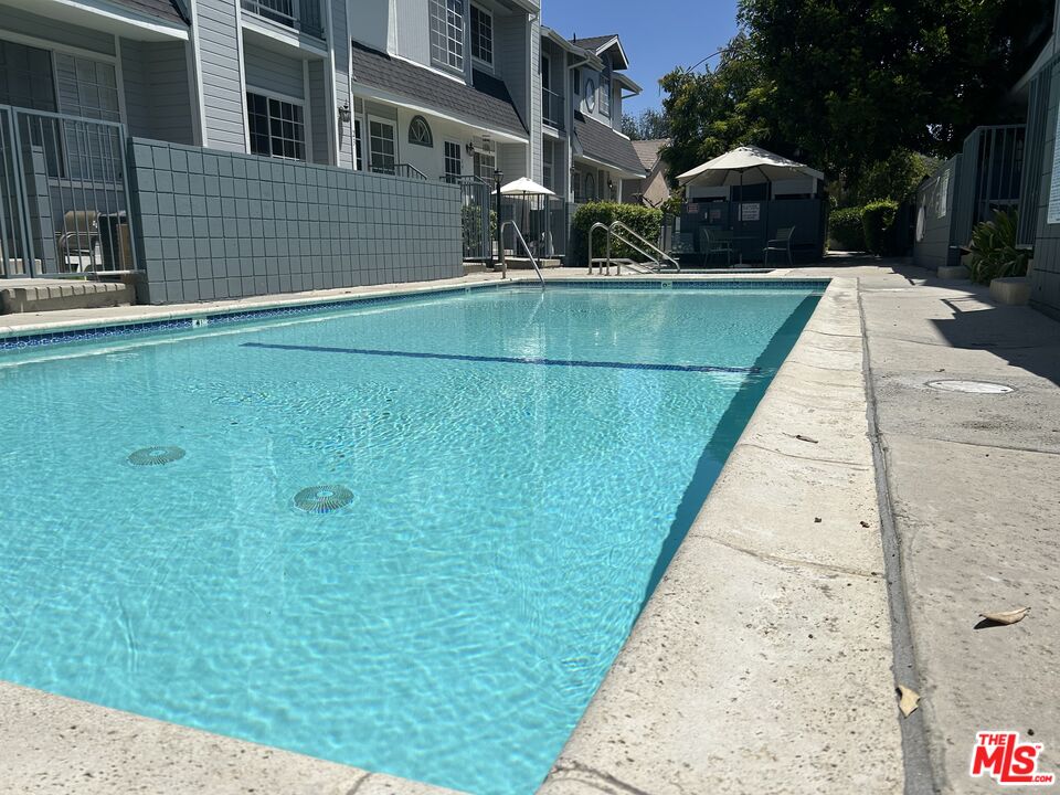 7430 Corbin Avenue, Unit 33 Reseda, CA 91335 - Photo 26 of 28 a view of outdoor space and yard