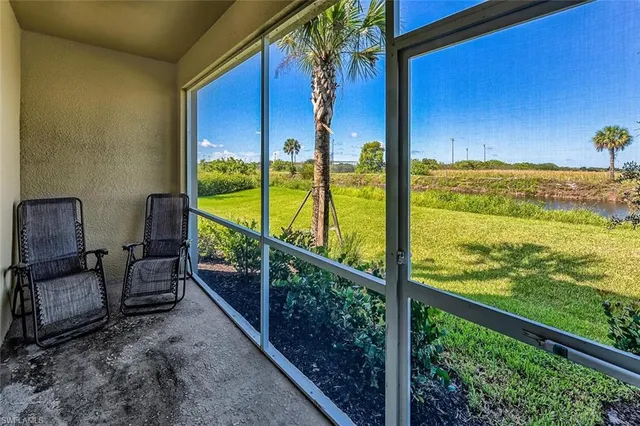 a view of swimming pool from a balcony