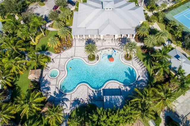 a view of a table chairs and a potted plant