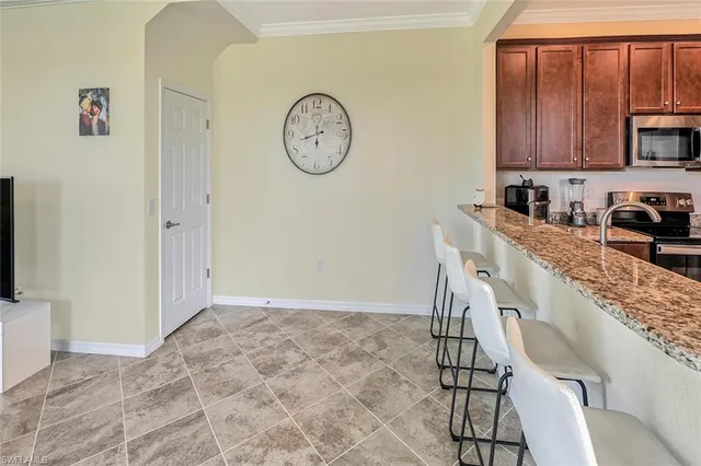 a view of a kitchen with furniture and window