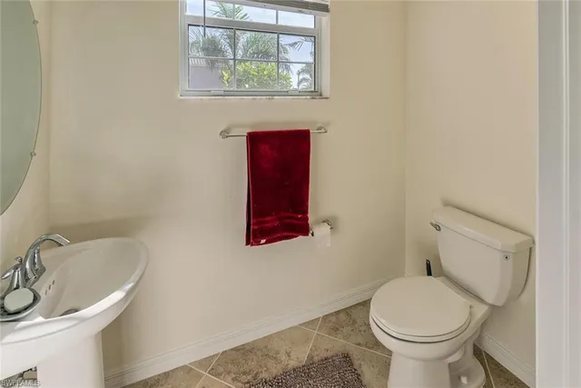 a bathroom with a toilet and a sink