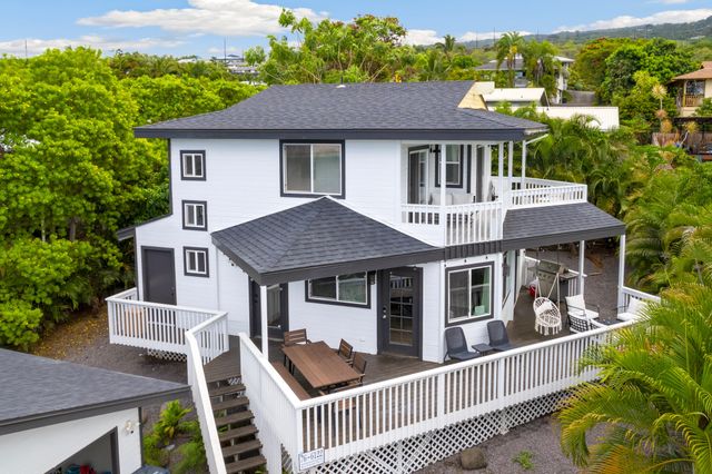 a house that has a lot of windows on it