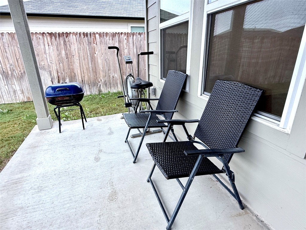 1305 Middleton Grove Lockhart, TX 78644 - Photo 9 of 19 a view of two chairs in the patio