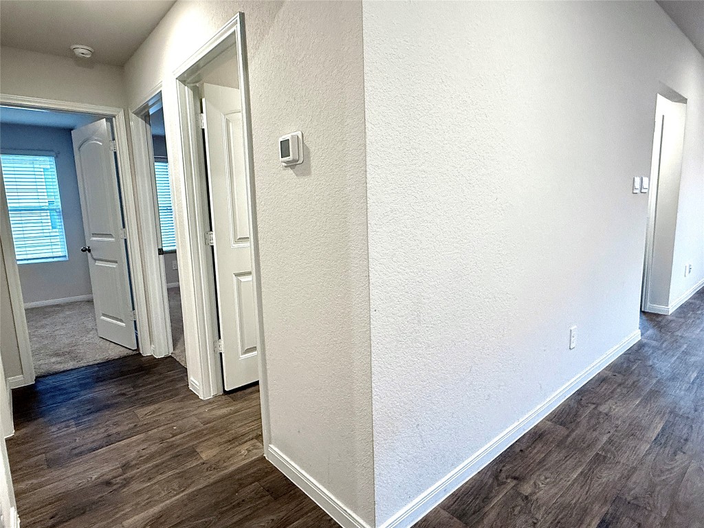 1305 Middleton Grove Lockhart, TX 78644 - Photo 14 of 19 a view of a bathroom with wooden floor