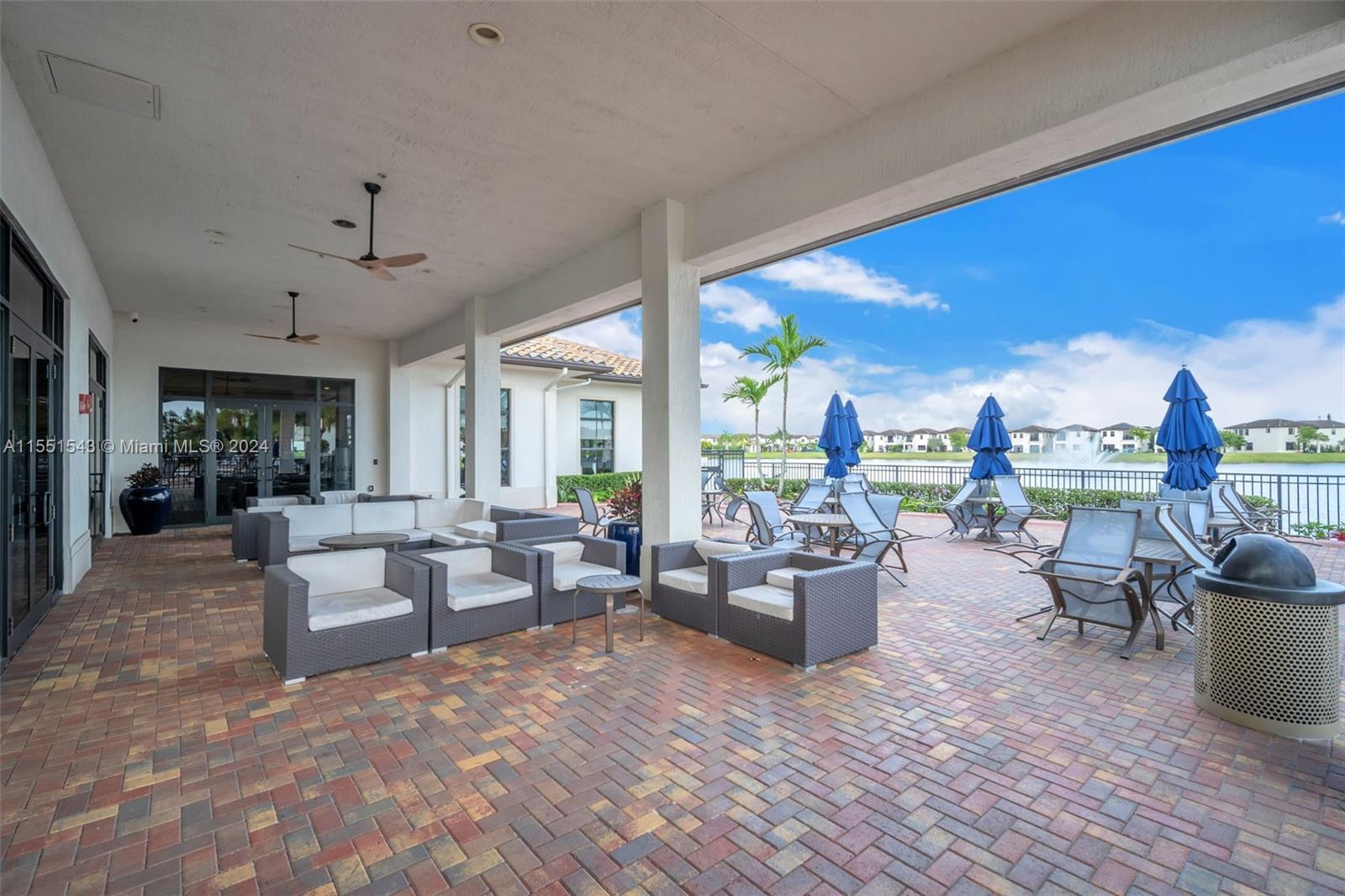 3544 West 97th Street Hialeah, FL 33018 - Photo 31 of 32 a living room with furniture and large windows