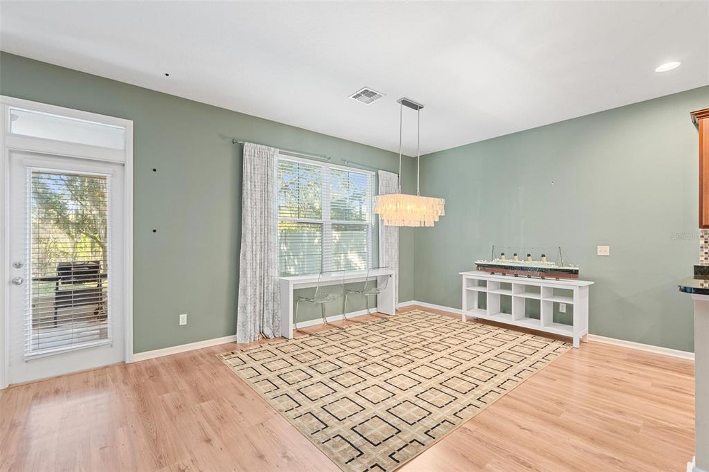 6799 Helmsley Circle Windermere, FL 34786 - Photo 13 of 61 a bedroom with a bed and a dresser