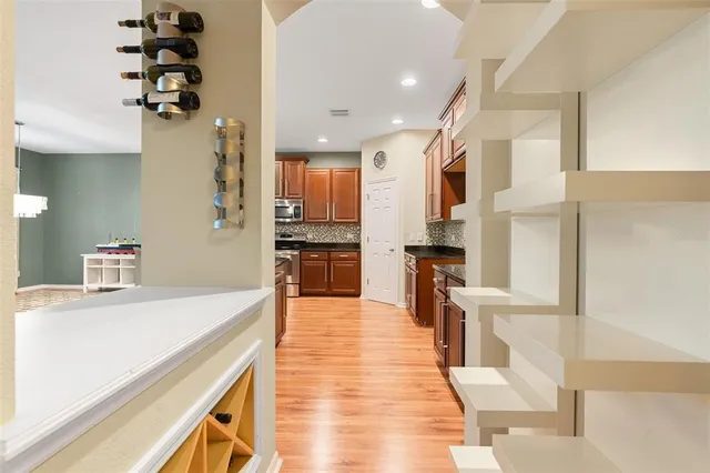 a view of a kitchen cabinets and a counter place
