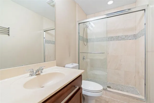 a view of a porch with furniture and a yard