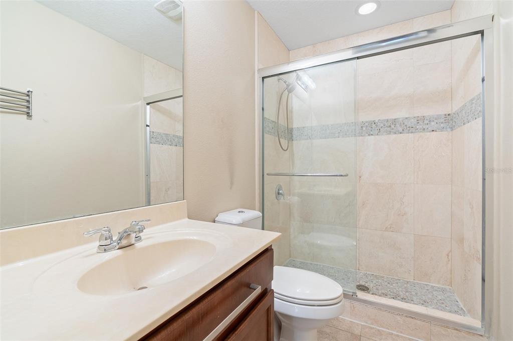 6799 Helmsley Circle Windermere, FL 34786 - Photo 36 of 61 a bathroom with a sink and a mirror