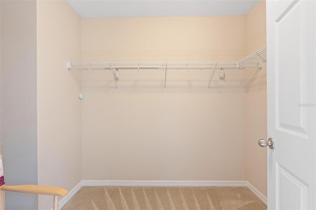 6799 Helmsley Circle Windermere, FL 34786 - Photo 37 of 61 a view of small space with racks on the wall