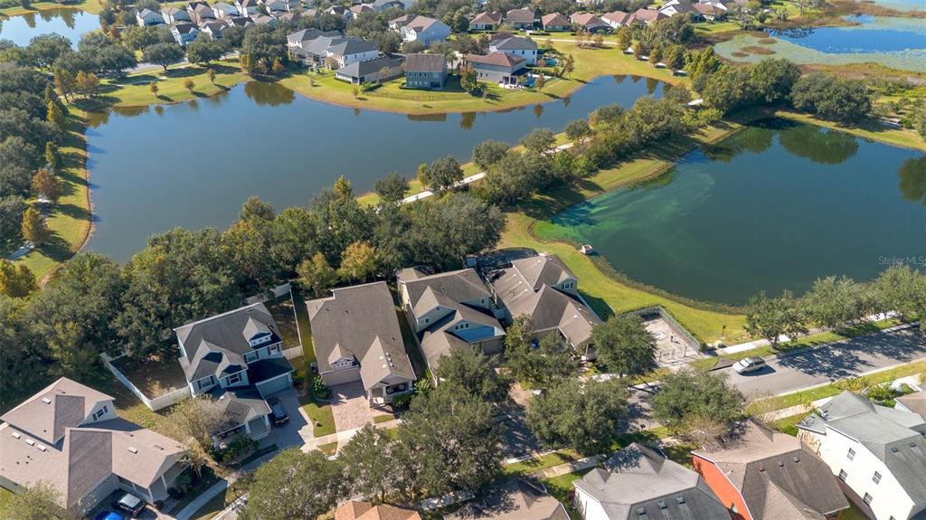 6799 Helmsley Circle Windermere, FL 34786 - Photo 47 of 61 an aerial view of a house with a lake view