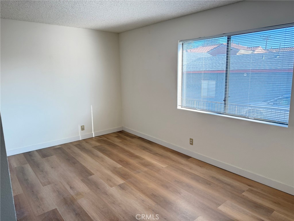 816 North Garfield Avenue, Unit B Alhambra, CA 91801 - Photo 9 of 12 an empty room with windows