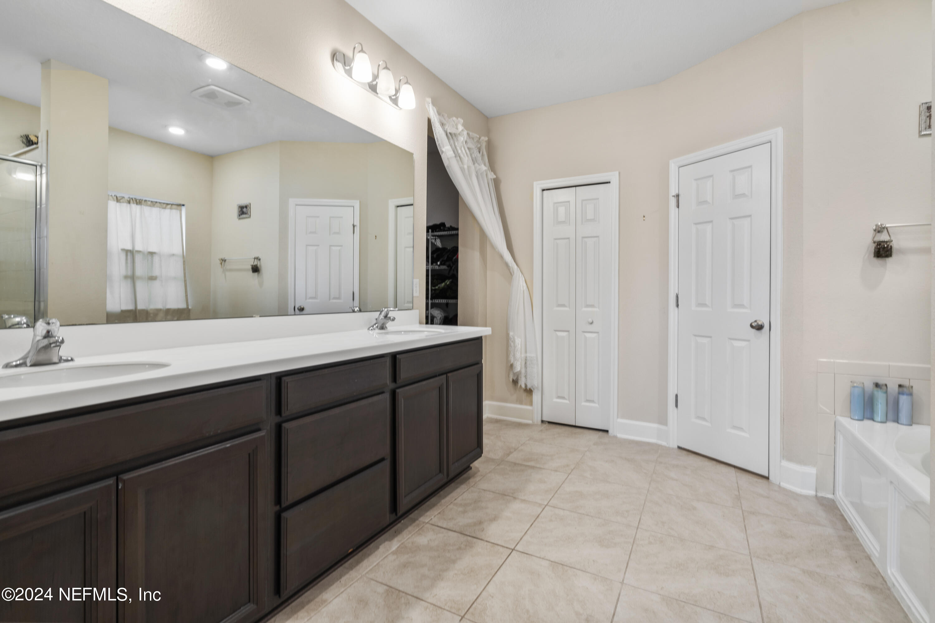 5633 Hampton Creek Road Jacksonville, FL 32218 - Photo 17 of 31 Storage Closet & Toilet Room