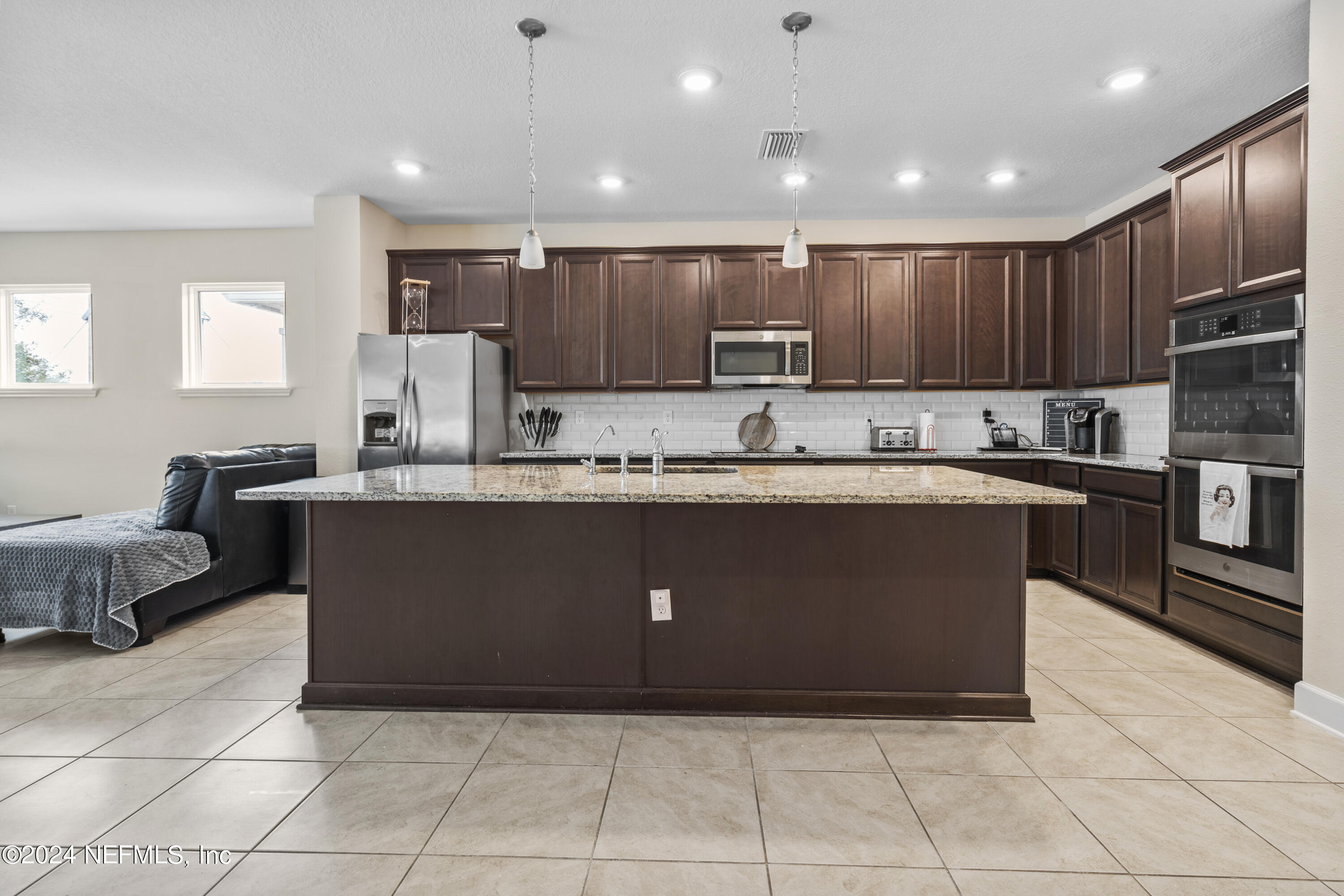 5633 Hampton Creek Road Jacksonville, FL 32218 - Photo 3 of 31 Oversized Kitchen Island