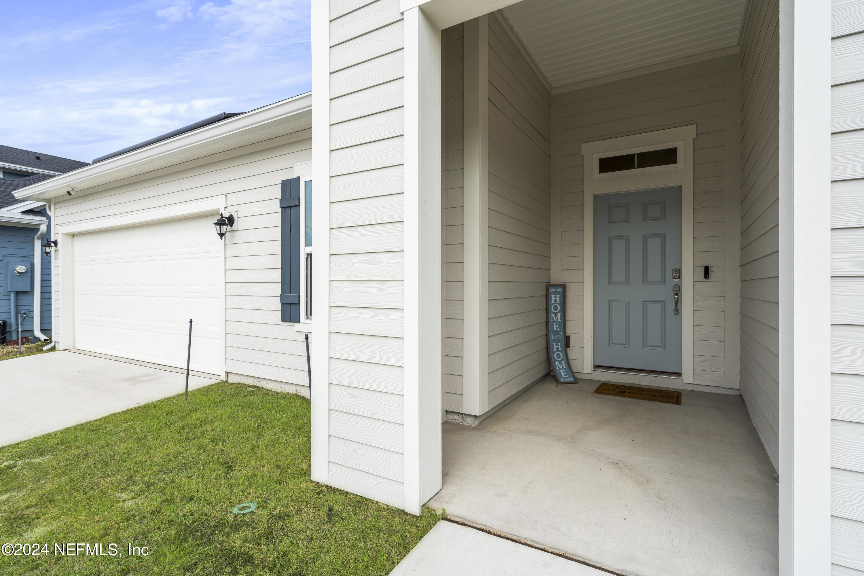 5633 Hampton Creek Road Jacksonville, FL 32218 - Photo 31 of 31 Covered Front Door