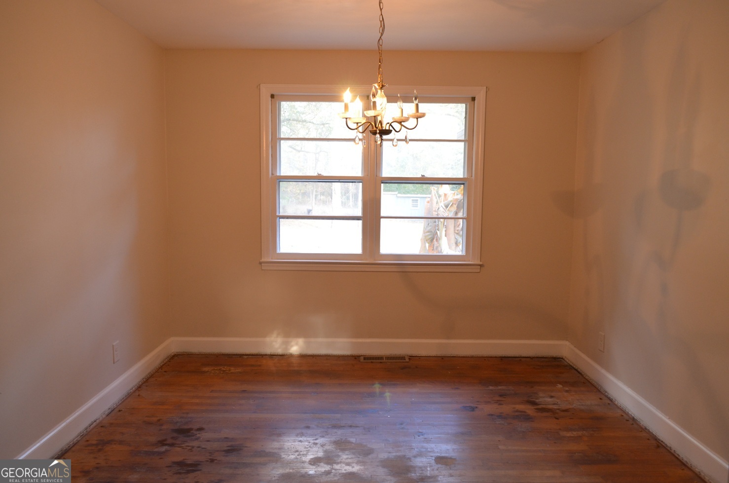 2655 Riverview Road Macon, GA 31204 - Photo 4 of 14 a view of a room with wooden floor and windows