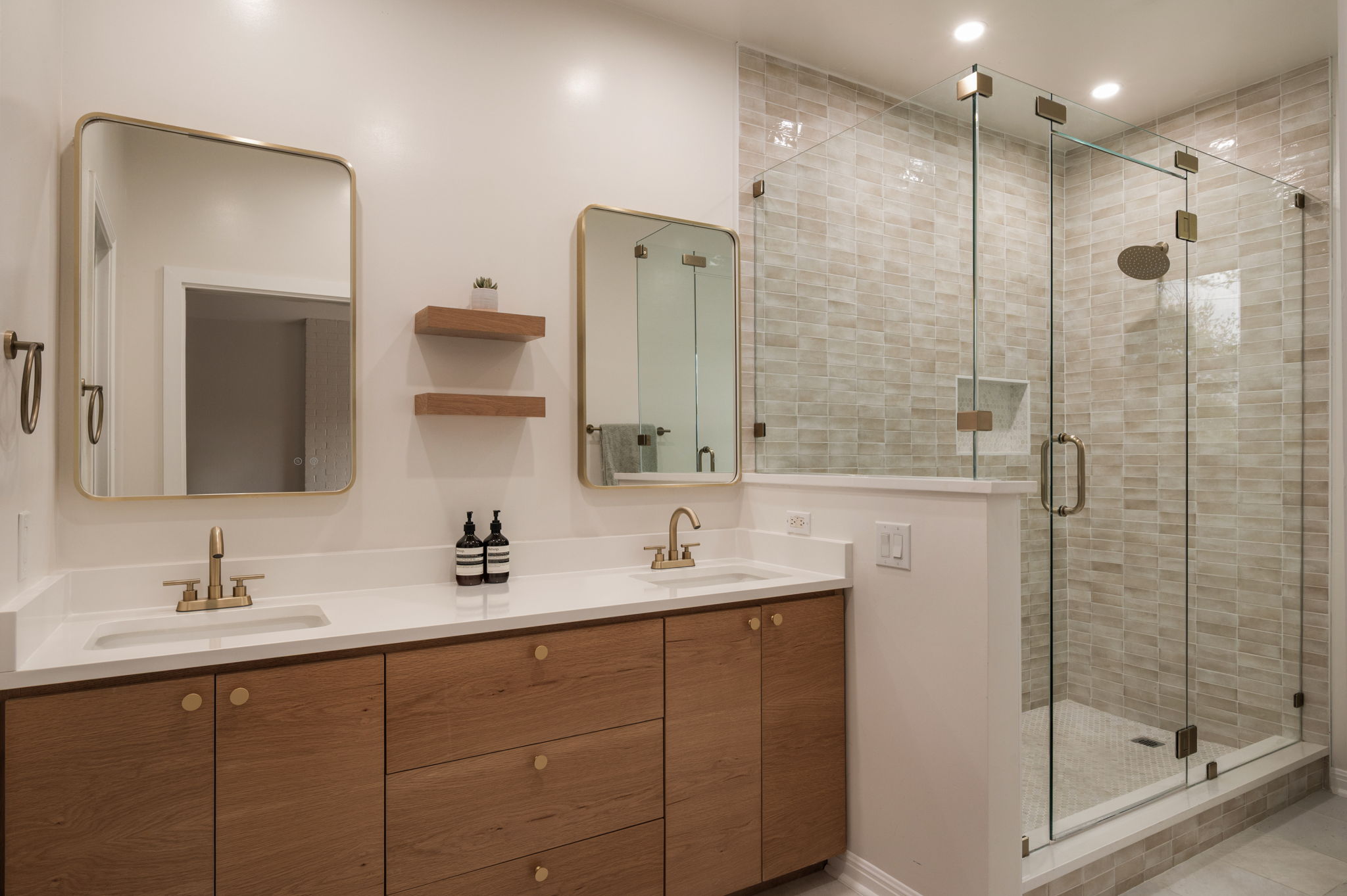 6501 Sumac Drive Austin, TX 78731 - Photo 16 of 40 Full bath featuring double vanity, a shower stall, and recessed lighting