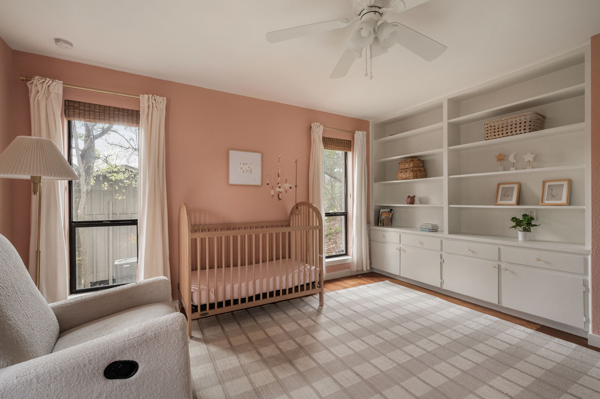 6501 Sumac Drive Austin, TX 78731 - Photo 23 of 40 Bedroom with a crib, ceiling fan, and light wood-style flooring
