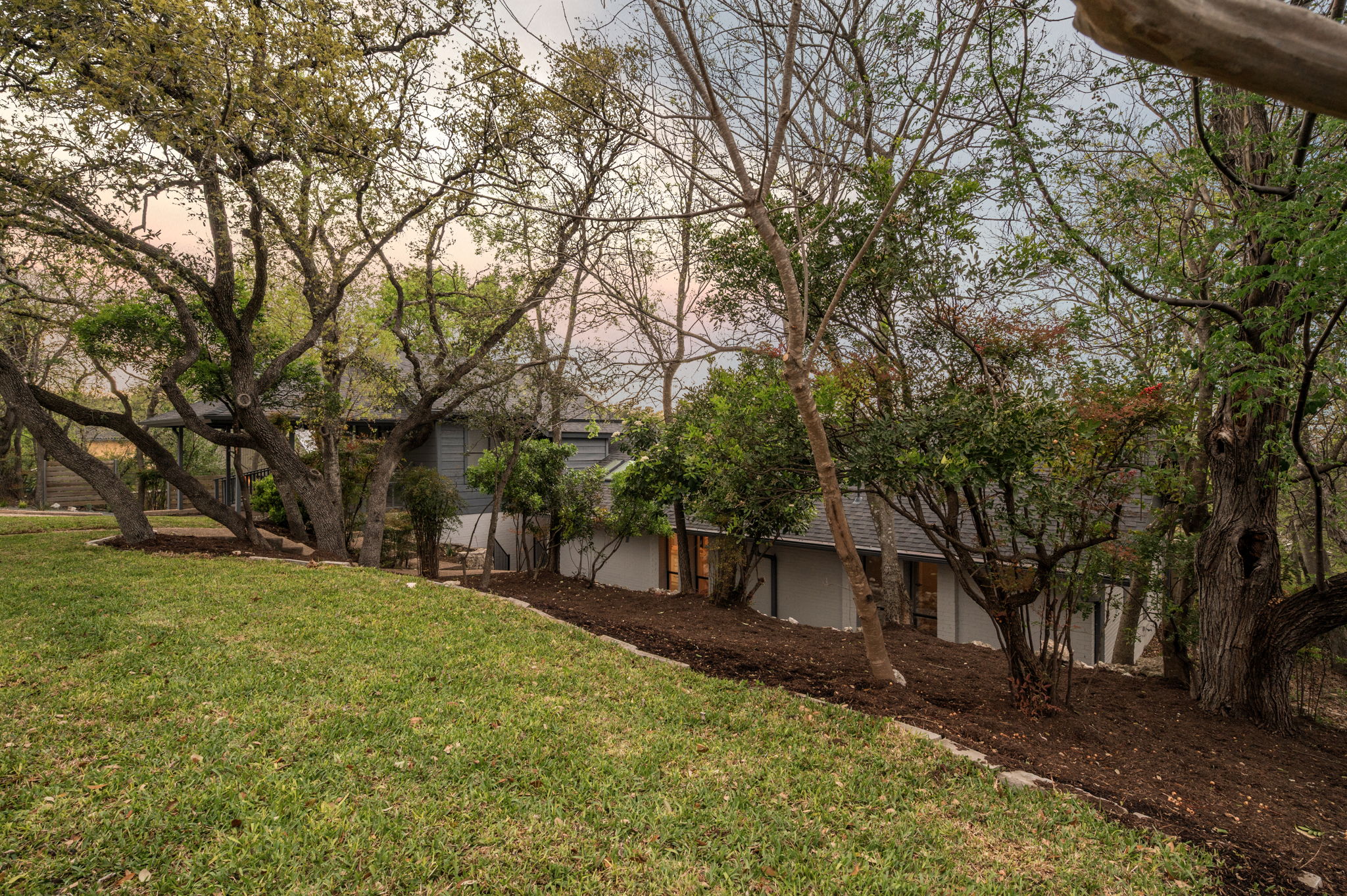 6501 Sumac Drive Austin, TX 78731 - Photo 33 of 40 Yard at dusk with a lawn