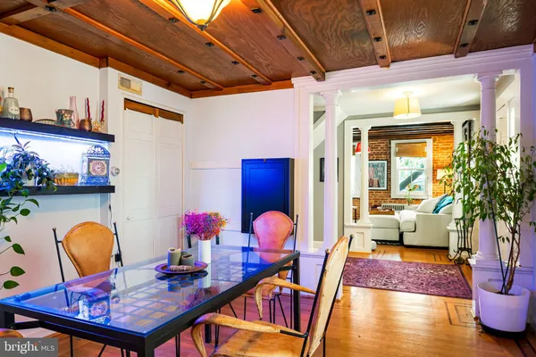 a view of balcony with wooden floor