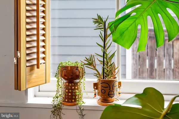 a kitchen with stainless steel appliances granite countertop a sink a stove counter space and cabinets