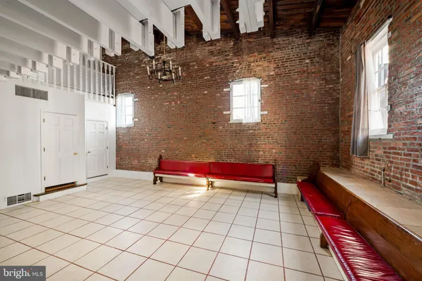 a view of empty room with windows