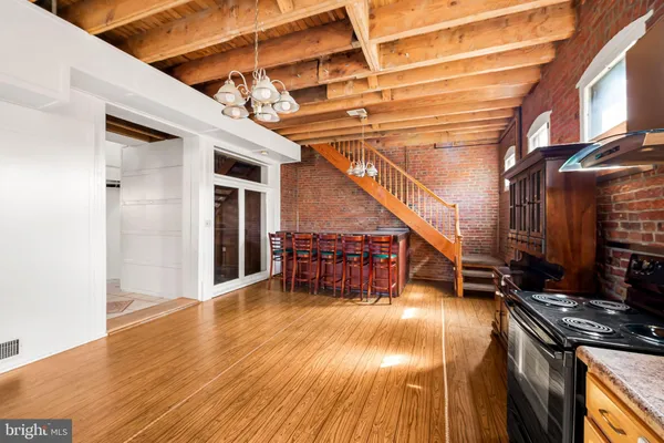 a view of a room with wooden walls