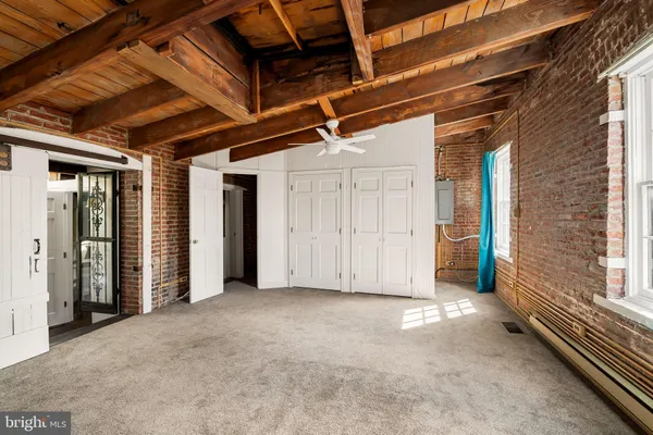 an empty room with windows