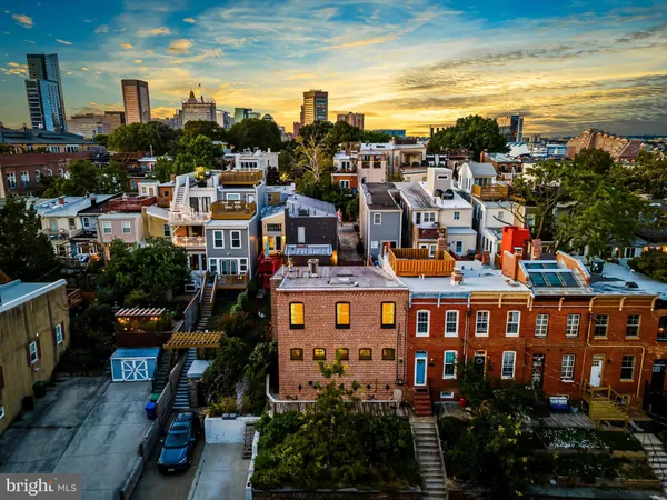 a view of a patio with a table and chairs