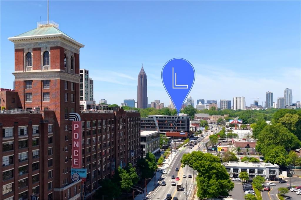 567 Ponce De Leon Avenue Northeast, Unit 405 Atlanta, GA 30308 - Photo 23 of 34 a view of a city with tall buildings