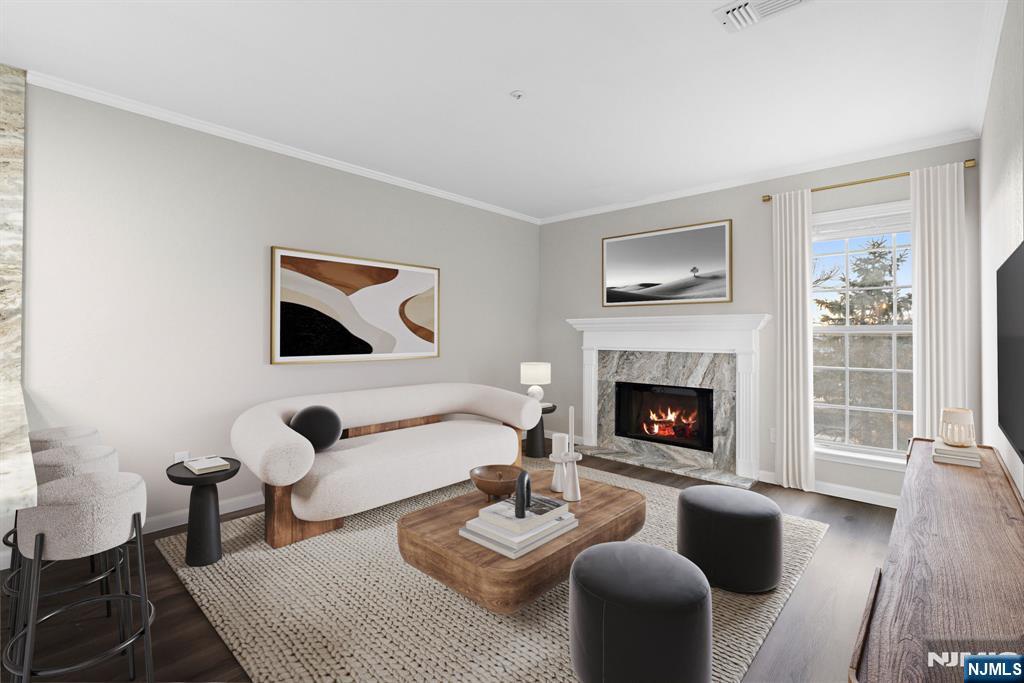 690 Rt 23 Wayne, NJ 07470 - Photo 2 of 11 a living room with furniture and a fireplace