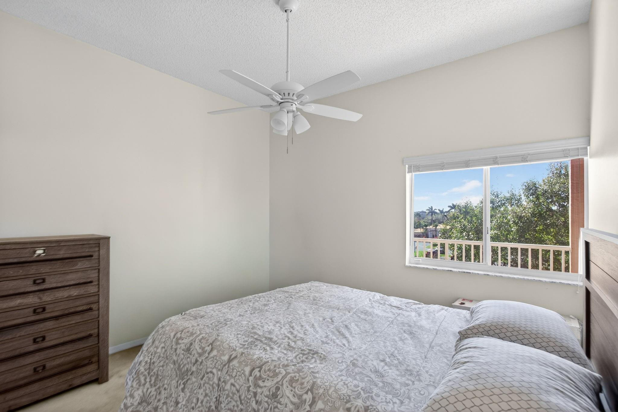 9575 Weldon Circle, Unit C413 Tamarac, FL 33321 - Photo 12 of 65 Guest bedroom