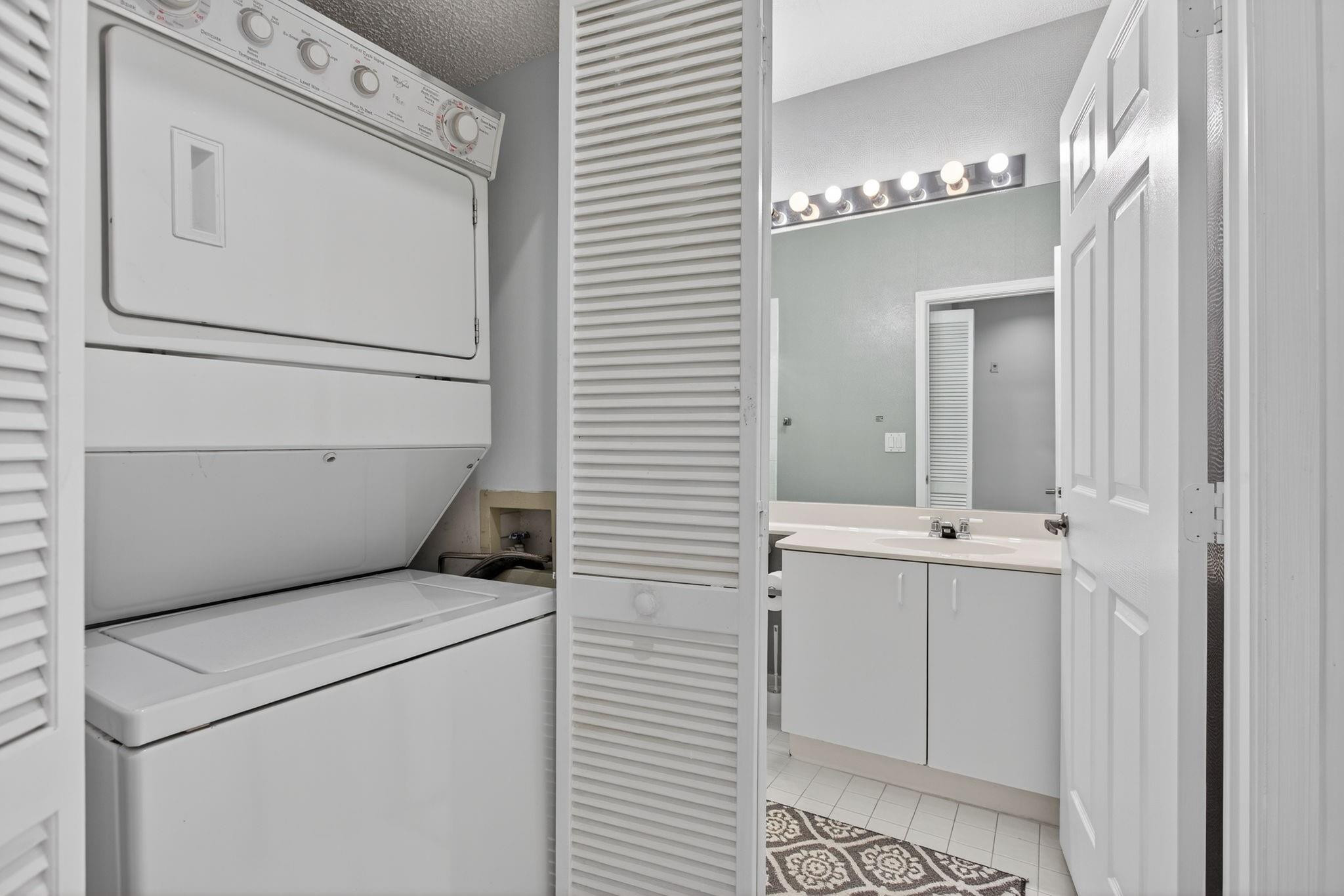 9575 Weldon Circle, Unit C413 Tamarac, FL 33321 - Photo 15 of 65 In-unit Washer & Dryer